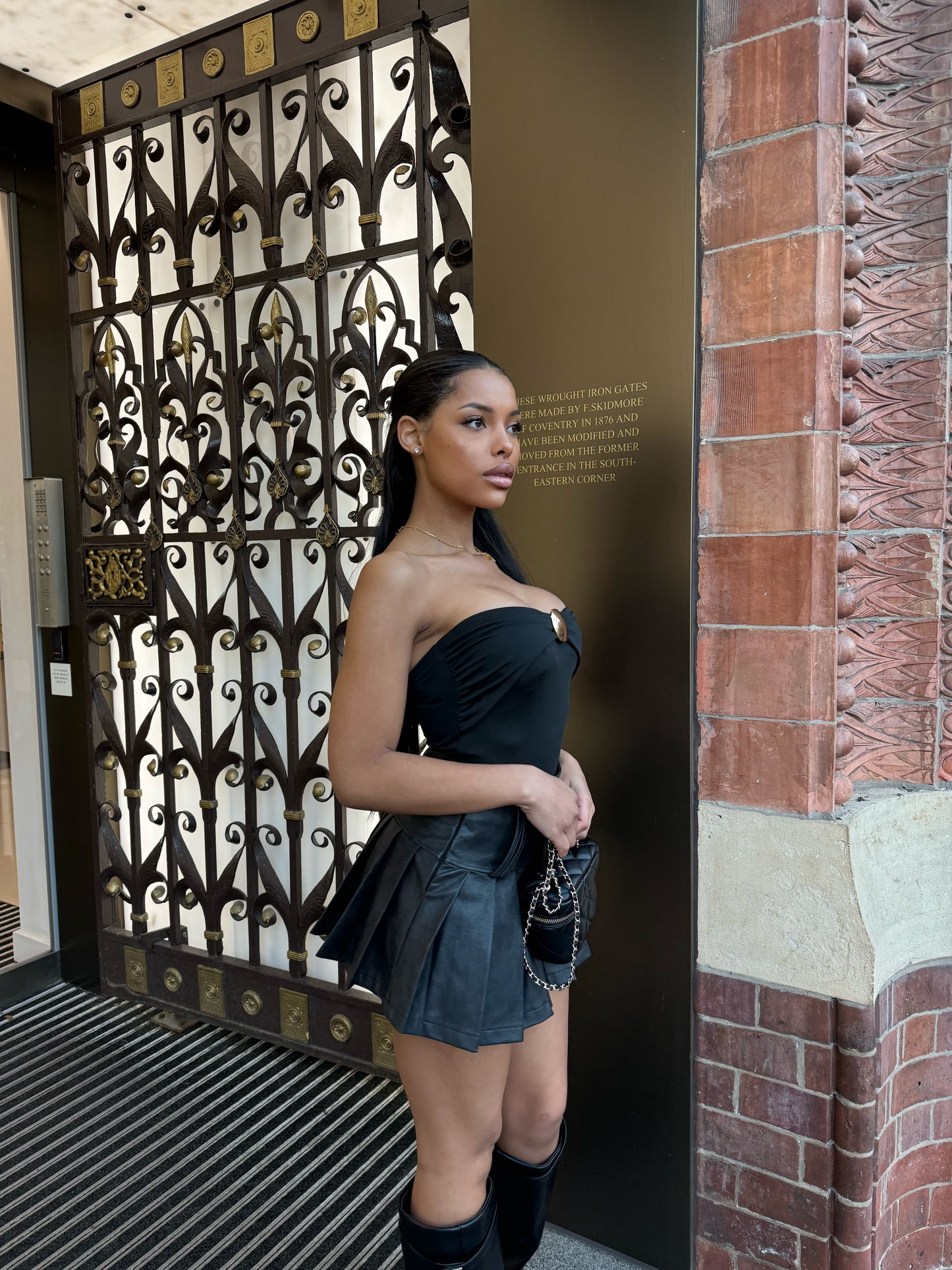 The ‘Raya’ Black Pleated Leather Mini Skirt