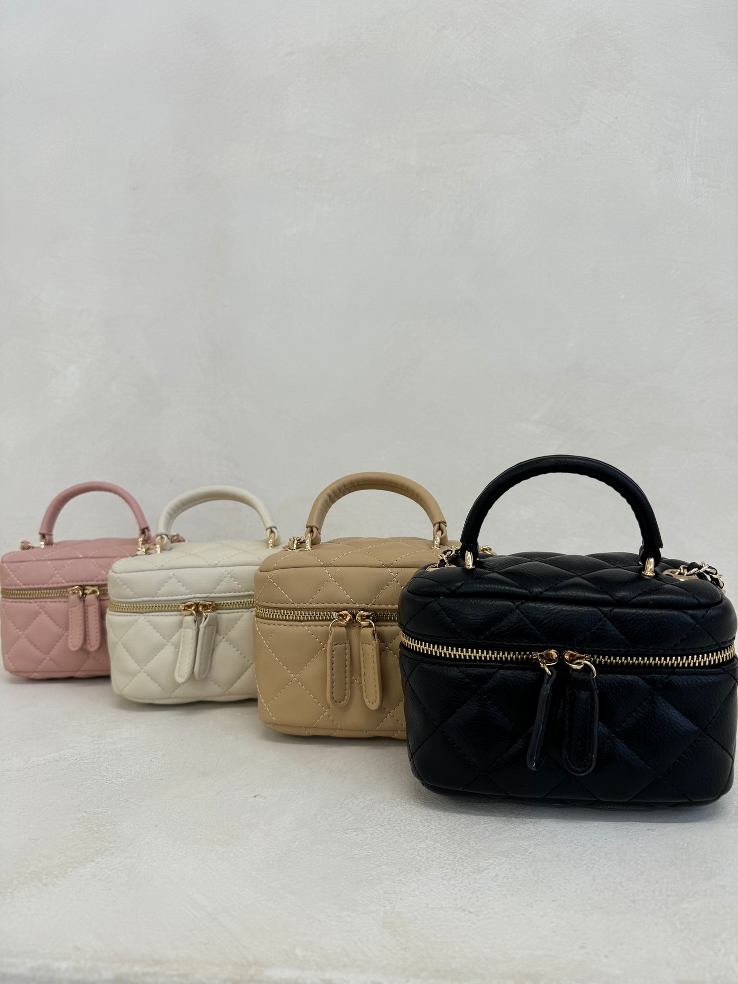 The ‘CC’ Mini Chain Bag Cream