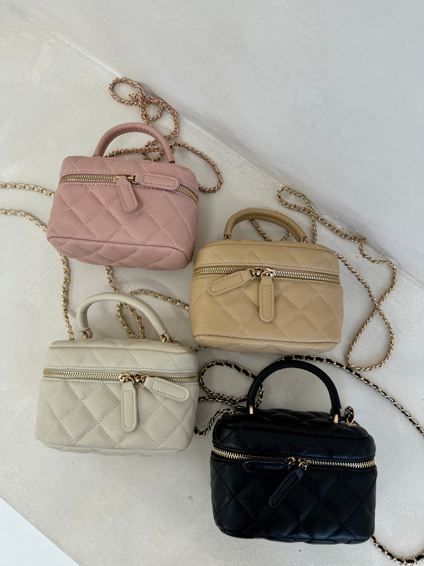 The ‘CC’ Mini Chain Bag Cream