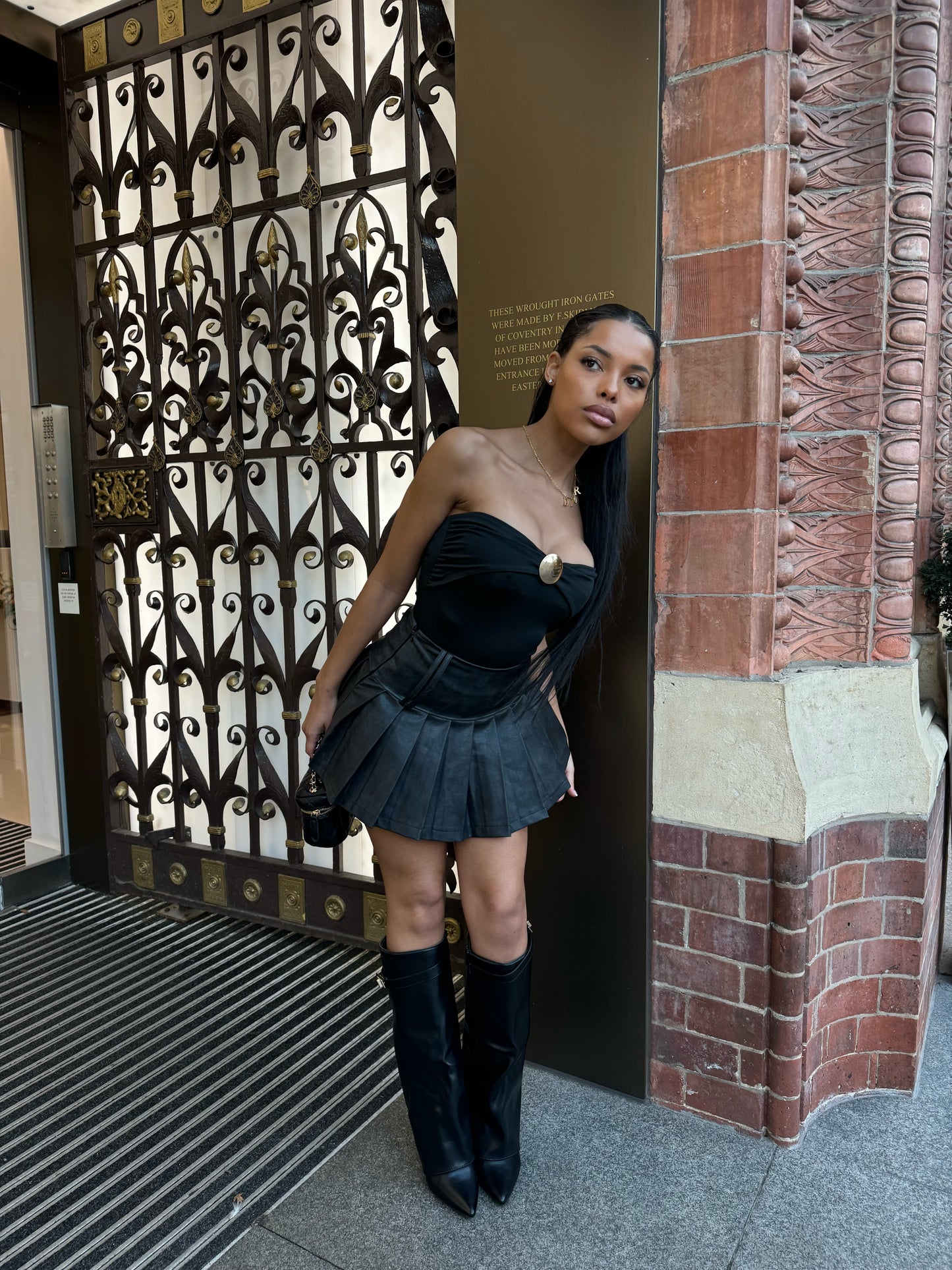 The ‘Raya’ Black Pleated Leather Mini Skirt